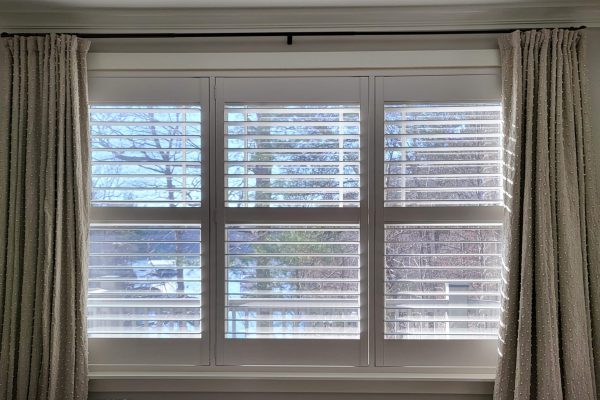 Custom Blinds in a Modern Living Room Elegant custom blinds enhancing a modern living room in Winston-Salem. Stylish Drapes in a Cozy Bedroom Luxurious drapes adding warmth and style to a cozy bedroom. Energy-Efficient Window Shades Energy-efficient window shades installed in a bright kitchen. Elegant Shutters for Home Privacy Beautiful wooden shutters providing privacy in a sunny living room. Versatile Roman Shades in Dining Area Versatile Roman shades adding sophistication to a dining area. Child-Safe Window Treatments Child-safe window treatments designed for a nursery in Raleigh. Blackout Curtains for a Home Theater Stylish blackout curtains perfect for a home theater setup. Light-Filtering Shades in a Home Office Light-filtering shades creating a bright, inviting home office.